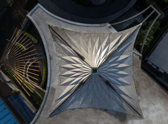 Transforming a restaurant site in Ho Chi Minh City into a luminous urban beacon through an origami-inspired steel roof that captures and refracts light throughout the day.